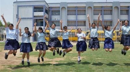  Students celebrate their success after announcement of CBSE class X results at their school in Gurgaon on Tuesday. (Source: PTI)