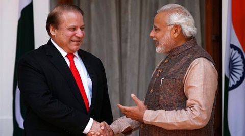 Indian Prime Minister Narendra Modi, right, shakes hand with his Pakistani counterpart Nawaz Sharif before the start of their meeting in New Delhi, Tuesday. (Source: AP photo)