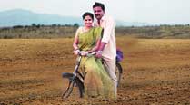 Girish Kulkarni and Sai Tamhankar in a still from Postcard