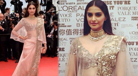 Sonam Kapoor was elegant in pale pink Anamika Khanna sari dress.