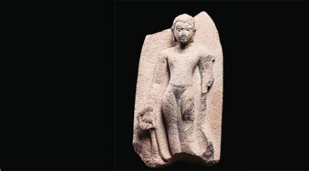 Dressed in a diaphanous robe, the calm sandstone Buddha has survived numerous centuries and also travelled numerous countries.