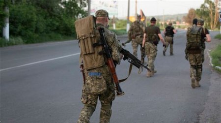 Putin's order appears to go further than his claim two weeks ago that troops were being pulled back from the border to shooting ranges. (AP)