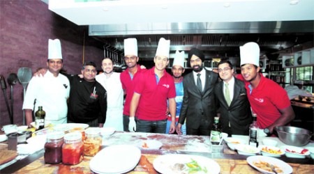 JW Marriott team with the Delhi Daredevils players, who were at the hotel for a cook-off; Chef Daniel Triver and batsman Ross Taylor
