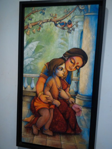 Mother Kaushalya helps her toddler son take his first steps Source: Express Photo