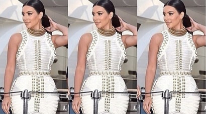 Kim Karadashian stuns in ivory and gold dress made of rope