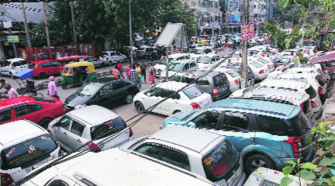 North corporation owns 115 parking lots in the city. Archive