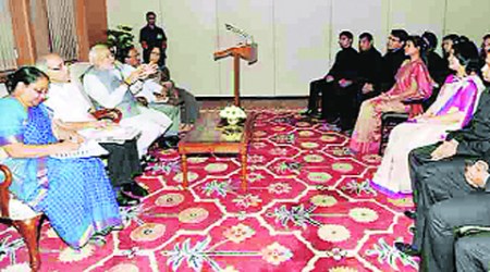 Narendra Modi with officer trainees of Indian Foreign Service in New Delhi on Thursday. 