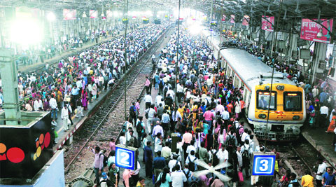 There was heavy rush to buy tickets and season passes at Churchgate railway station on Tuesday, a day before the fare hike comes into effect. (Amit Chakravarty )
