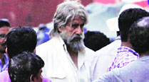 Amitabh Bachchan wears a haggard, shabby look with long grey hair in Shamitabh