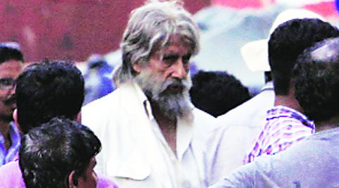 Amitabh Bachchan wears a haggard, shabby look  with  long grey hair in Shamitabh