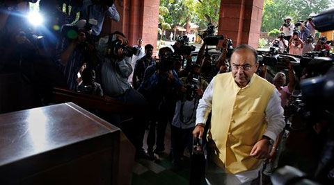 Indian Finance Minister Arun Jaitley arrives to present the 2014-15 union budget at the Indian parliament in New Delhi. (Source: AP photo)