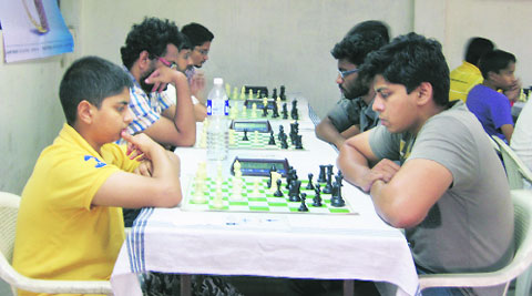 Abhimanyu Puranik (left) takes on Gaurav Konde during the Rapid Chess championship.