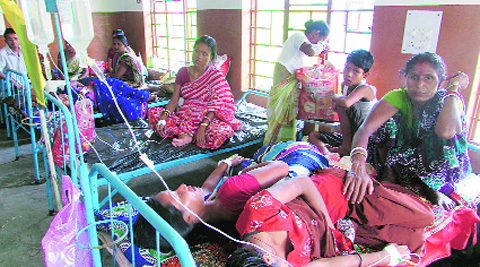 Patients admitted with fever at Dhupguri Hospital in West Bengal’s Jalpaiguri on Tuesday.  Source: Express Photo