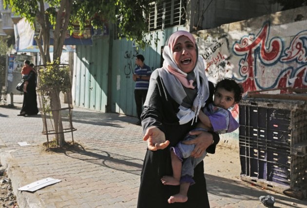 Gaza crisis: Israel warns of more airstrikes; Palestinians flee their ...