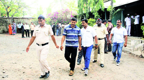 Gurav being taken to police custody. (Source: Express photo by Rajesh Stephen)