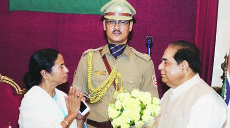 CM Mamata Banerjee greets Bihar Governor D Y Patil after he took additional charge as West Bengal Governor, in Kolkata Friday. (Source: Express)