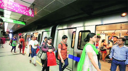 Commuters at the newly opened Mandi House Metro station. (Source: Express)