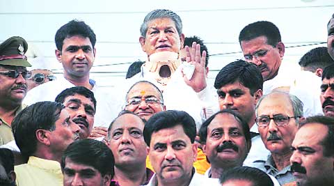 CM Harish Rawat after the results were announced in Dehradun on Friday. (Source: Expres photo by Virender Singh Negi)