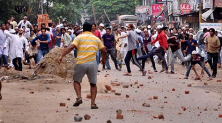 Three persons were killed on Saturday  and 19 others, including policemen, injured in the clashes between two communities over a land disput.