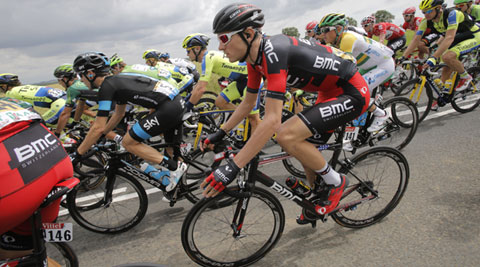 Tejay van Garderen of the U.S. (C) rides in the pack during the fourth stage of the Tour de France. (Source: AP)