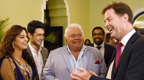 Britain's Deputy PM, Nick Clegg with former Indian cricketer Farokh Engineer and Bollywood actor Juhi Chawla at Taj Mahal Hotel in Mumbai on Tuesday. (Source: PTI)