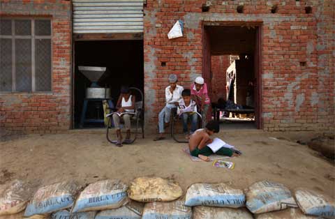 Children studying at newly established Ahmednagar near Shahpur. (Source: Express photo by Oinam Anand)