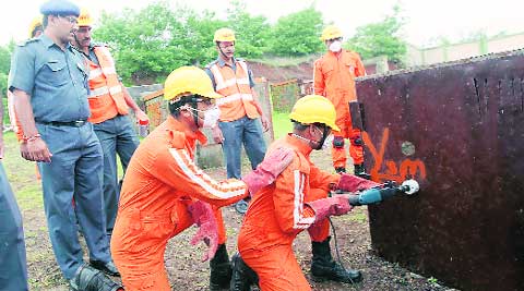 NDRF at a rescue demonstration held for the media on Monday. (Source: Express photo by Sandeep Daundkar)