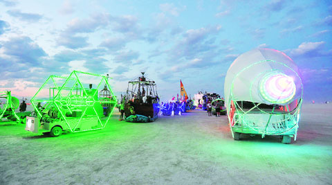 Art cars are lined up to be registered at the Black Rock DMV. (Source: AP photo)