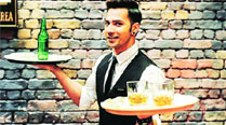 Varun Dhawan as a waiter