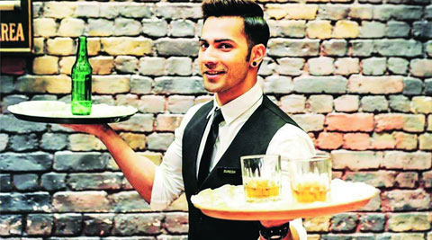 Varun Dhawan as a waiter