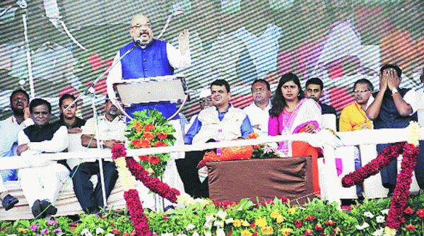 Amit Shah addresses the gathering in Chondi, Ahmednagar, where Pankaja Palwe-Munde concluded her statewide tour Thursday. (Source: Express photo)