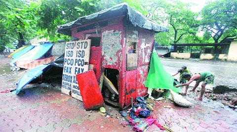 After years of neglect, this shed for BEST staffers at the Mantralaya bus stop has become an extension of the pavement dwellers’ homes. It also serves as a storage space for their belongings. (Source: Express photo by Vasant Prabhu)