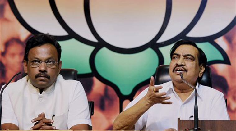 Maharashtra BJP leaders Eknath Khadse and Vinod Tawade during a press conference after a meeting with party President Amit Shah at party headquarter in New Delhi on Sunday. (Source: PTI) 