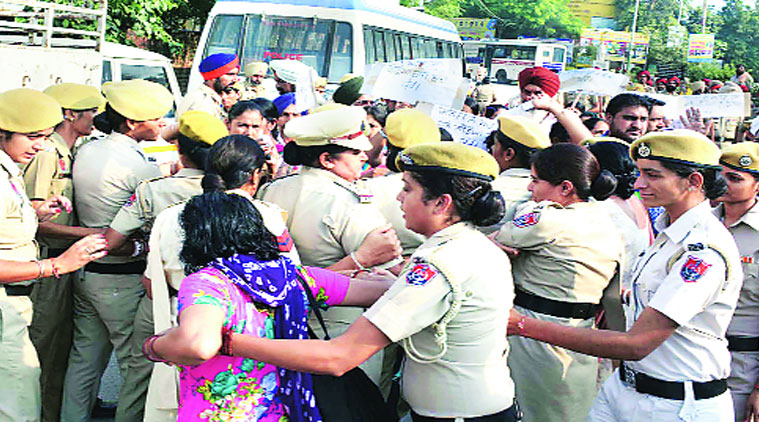 Police round up protesters during a bandh in Faridkot on Friday. (source: Express photo)