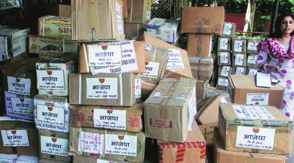 The BJP sent off another consignment of supplies to Jammu & Kashmir on Friday. (Source: Express photo by Prem Nath Pandey)