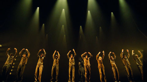 (Top) Hofesh Shechter; the gesture of raising the arms is ceremonial, ancient and open to interpretation