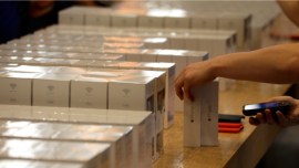 Across continents, Apple fanbois queue up for the new iPhone