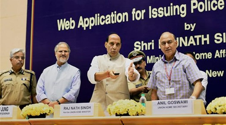 Union Home Minister Rajnath Singh, Lieutenant Governor of Delhi Najeeb Jung, Union Home secretary Anil Goswami and Delhi Police Commissioner B S Bassi at the launch of Delhi Police web application for issuing Police Clearance Certificate, in New Delhi on Friday.