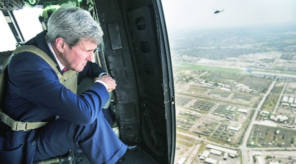 US Secretary of State John Kerry looks out from a helicopter over Baghdad on Wednesday.Source: AP
