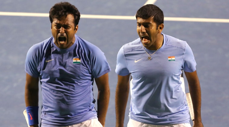 Leander Paes(left) and Rohan Bopanna exults after their Devis cup victory against Serbia (Source: AP)
