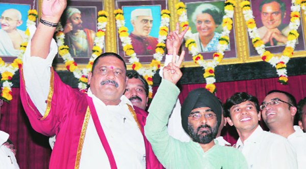 Mayor Ashok Devram Murtadak (left) after his election on on Friday. (Source: PTI)