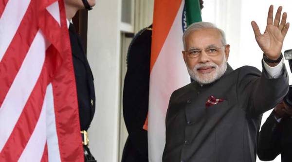 Prime Minister Narendra waves as he arrives at the White House in Washington DC for a meeting with US President Barack Obama on Tuesday. (Source: PTI Photo)