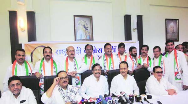 NCP leaders with the Independent MLAs who joined the party Monday. ( Source: Express photo by Ganesh Shirsekar )