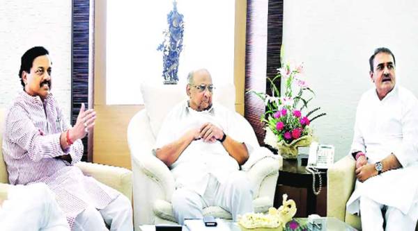 Sharad Pawar with Praful Patel and Sunil Tatkare at an NCP meeting in Mumbai Monday. ( Source: PTI )