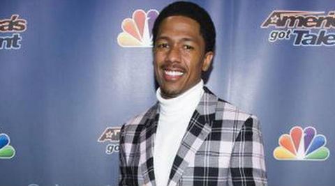 Nick Cannon's 'Neon Aliens Ate My Homework and Other Poems' will hit store shelves in March, 2015. (Source: AP)