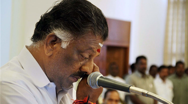 AIADMK leader O Panneerselvam gets emotional while taking oath as Tamil Nadu Chief Minister in absence of jailed party chief J Jayalalithaa at Raj Bhavan, Chennai on Monday.
