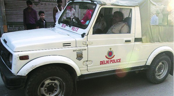 Police at the scene of crime in Maujpur, Northeast Delhi (Source: Express Photo by Prem Nath Pandey)