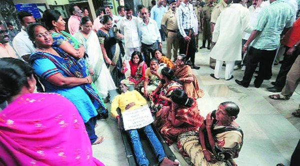 Shiv Sena activists Thursday staged a protest in the office of PMC health chief S T Pardeshi against the civic body’s failure to check spread of dengue. (Source: Express photo)