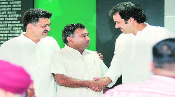 Ravinder Rawal (centre) with Kuldeep Bishnoi and Chander Mohan during a press conference in Chandigarh on Thursday.  (Source: Express Photo by Jaipal Singh)