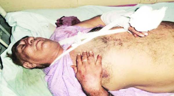 Injured Major (retd) Gobind Bakshi being treated at the Dera Bassi civil hospital. ( Source: Express photo )